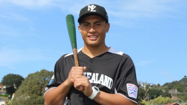 Baseball player Cooper Hutchinson holding baseball bat