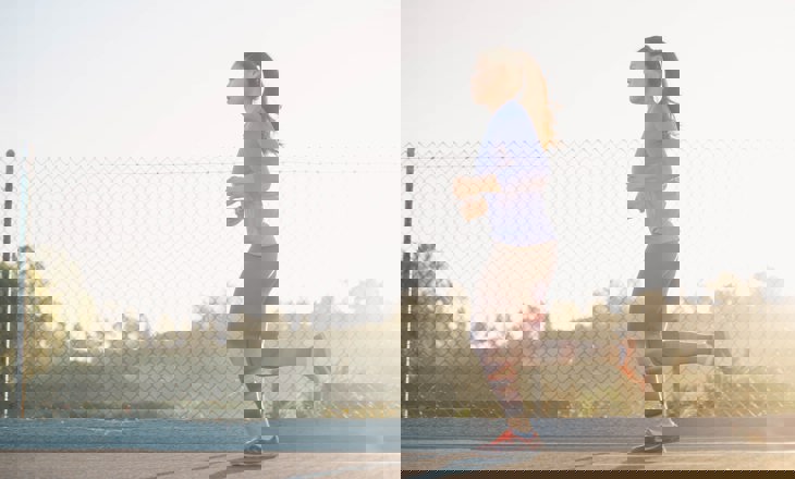 Girl running on road