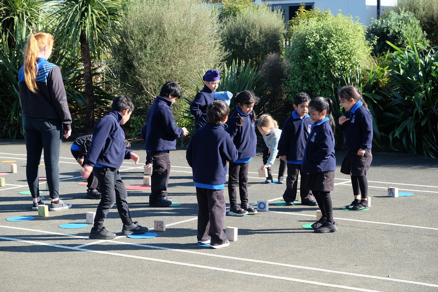 Tamariki playing on a school court