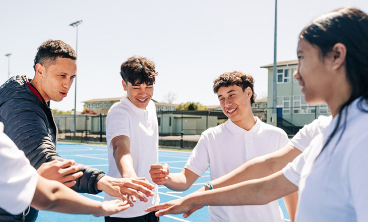 Team mates in a huddle before a match