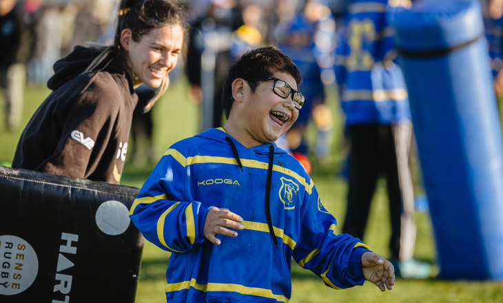 Tamariki laughing to something off camera