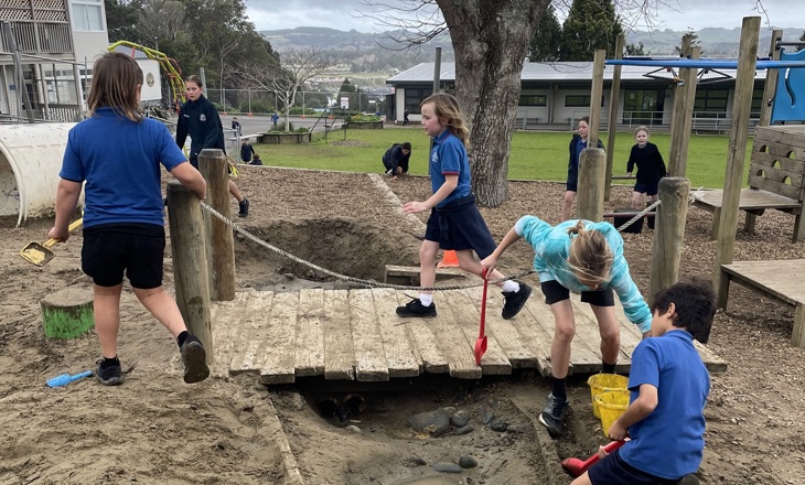 Kids playing in a sandpit